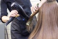 Hair dryer drying. hair styling in a beauty salon