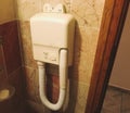 Hair dryer in the hotel. old, inconvenient model. a huge bulky hair dryer is attached to the wall, a non-portable design. hair