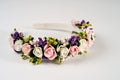 Hair hoop decorated with delicate color artificial flowers