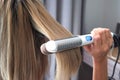 Hair iron straightening beauty care salon spa Royalty Free Stock Photo