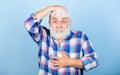 Hair loss. Early signs balding. Man losing hair. Artificial hair. Health care concept. Elderly people. Bearded Royalty Free Stock Photo