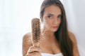 Hair Loss. Upset Woman Holding Brush With Hair Royalty Free Stock Photo