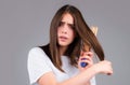 Hair loss woman with a comb and problem hair. Hairloss and bald problems concept.