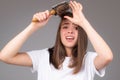 Hair loss woman with a comb and problem hair. Hairloss and hairs problems. Sad girl with damaged hair. Haircare and loss Royalty Free Stock Photo