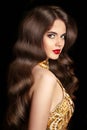 Hair. Makeup. Beautiful brunette girl with long wavy shiny hairs Royalty Free Stock Photo