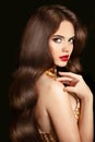 Hair. Makeup. Beautiful brunette girl with long wavy shiny hairs Royalty Free Stock Photo