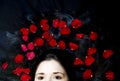 Hair with rose petals Royalty Free Stock Photo