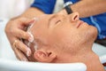 Hair salon. Washing with shampoo. Royalty Free Stock Photo