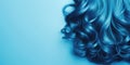 Hair style banner. Close up of blue woman\'s hair on light blue background. Glossy wavy hair