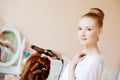 Hair stylist makes the bride on the wedding day Royalty Free Stock Photo