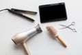 Tablet pc, scissors, hairdryer, hot iron and brush