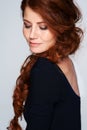 Hair, woman and studio or salon for growth treatment, keratin and highlights in hairstyle. Happy female person, redhead