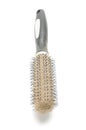 Hairbrush with hairs on the white background
