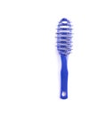 Hairbrush isolated. Blue plastic comb on white background. Hair comb closeup