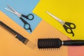 Scissors and comb. Barber scissors for cutting hair on a colored background. Hairdressing equipment concept, hairdressing set. Royalty Free Stock Photo