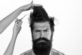 Haircut. Barber Shop procedures. Hairdresser concept. Woman cuts hair with scissors. Man with long beard, mustache and Royalty Free Stock Photo