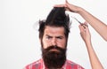 Haircut. Barber Shop procedures. Hairdresser concept. Woman cuts hair with scissors. Man with long beard, mustache and Royalty Free Stock Photo