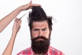 Haircut. Barber Shop procedures. Hairdresser concept. Woman cuts hair with scissors. Man with long beard, mustache and Royalty Free Stock Photo