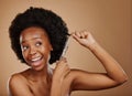 Haircut, scissors or excited black woman with afro in studio on a brown background for positive change. Smile