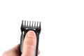 Haircut trimmer close-up. Hand with Hair cut machine isoalted on white Royalty Free Stock Photo