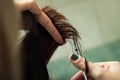 Hairdresser cutting hair Royalty Free Stock Photo