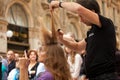 Hairdresser cutting woman`s hair
