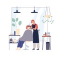 Hairdresser dyeing hair of woman client sitting in chair in beauty salon. Hairstylist colorist with paint and brush Royalty Free Stock Photo