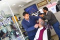 Hairdresser man shearing client at Istanbul hair salon Istanbul