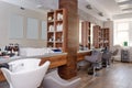 Hairdresser`s workplace. Modern beauty salon. Hair salon interior business