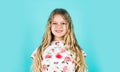 Hairdresser salon. Enjoy silky hair. Adorable small child. Pretty girl curly hair blue background. Beautiful little