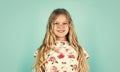 Hairdresser salon. Enjoy silky hair. Adorable small child. Pretty girl curly hair blue background. Beautiful little