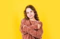 Hairdresser salon. Pretty girl curly hair yellow background. Adorable small child. Beautiful little model. Healthy curls