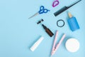 Hairdresser tools on blue background with copy space Royalty Free Stock Photo