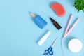 Hairdresser tools on blue background with copy space Royalty Free Stock Photo