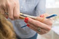 Hairdresser trimming ombre hair with scissors Royalty Free Stock Photo