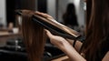 hairdresser using a flat iron to create a sleek and shiny generative AI