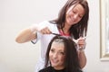 Hairdressing beauty salon. Woman dying hair. Hairstyle.