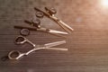 Hairdressing different scissors on table in professional hairdressing salon