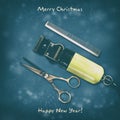 Hairdressing scissors, comb, and clipper on a dark background. Happy New Year and Merry Christmas. Greeting card for Royalty Free Stock Photo