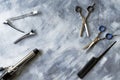 Hairdressing supplies: scissors, comb, hair tongs and clips.