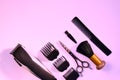 Hairdressing various accessories on a pink background. the concept of the hairdressing beauty industry. Royalty Free Stock Photo