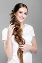 Hairstyle braid. woman with long hair