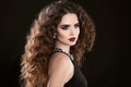 Hairstyle. Fashion brunette girl with Long curly hair, beauty ma Royalty Free Stock Photo