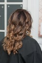 Hairstyle female curls on dark hair up