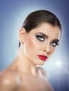 Hairstyle and make up - beautiful female art portrait with beautiful eyes. Elegance. Genuine natural brunette in studio