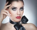 Hairstyle and Make up - beautiful female art portrait with black ribbon. Elegance. Genuine Natural brunette with ribbon - studio