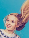 Crazy blonde woman with windblown blonde hair Royalty Free Stock Photo