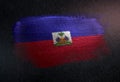 Haiti Flag Made of Metallic Brush Paint on Grunge Dark Wall