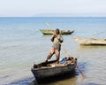 Haitian Fisherman Launching his Boat Royalty Free Stock Photo