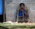 Haitian Young Girl on Porch Royalty Free Stock Photo